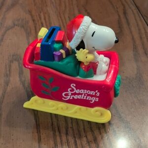 Snoopy Christmas Decoration Coin Bank Whitman's Candies Sleigh Sled Santa Decor